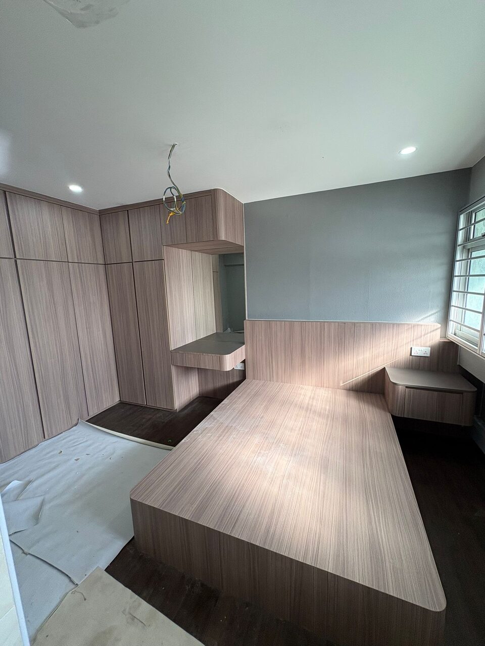 Bedroom — platform bed and wardrobe wall