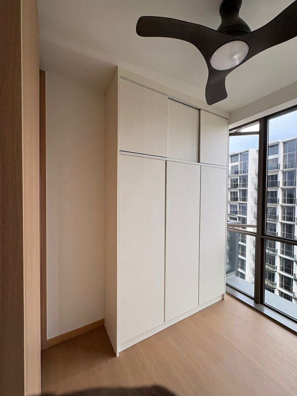 Bedroom wardrobe with city view