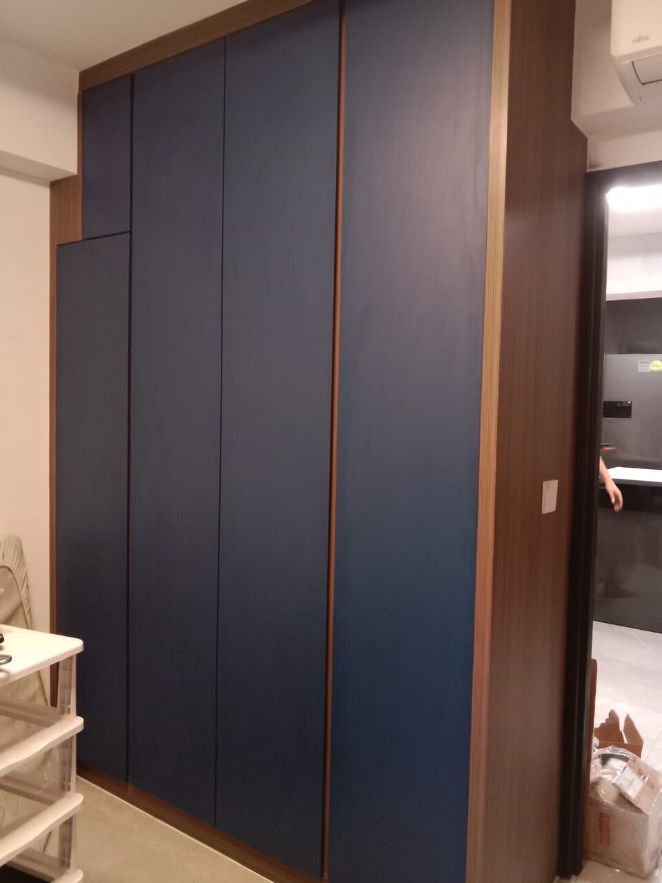 Navy bedroom wardrobe with oak frame