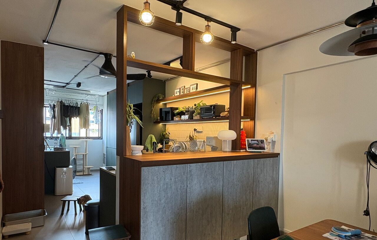 Open-concept view through the divider from the dining side